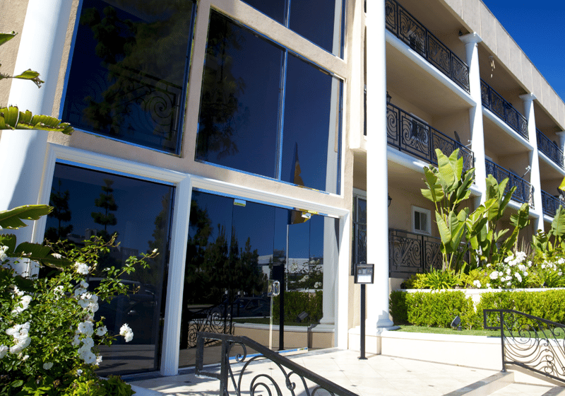 Multi-tenant building with access control pad out front 